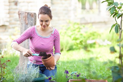 Landscape contractor outlining waste disposal and compliance terms